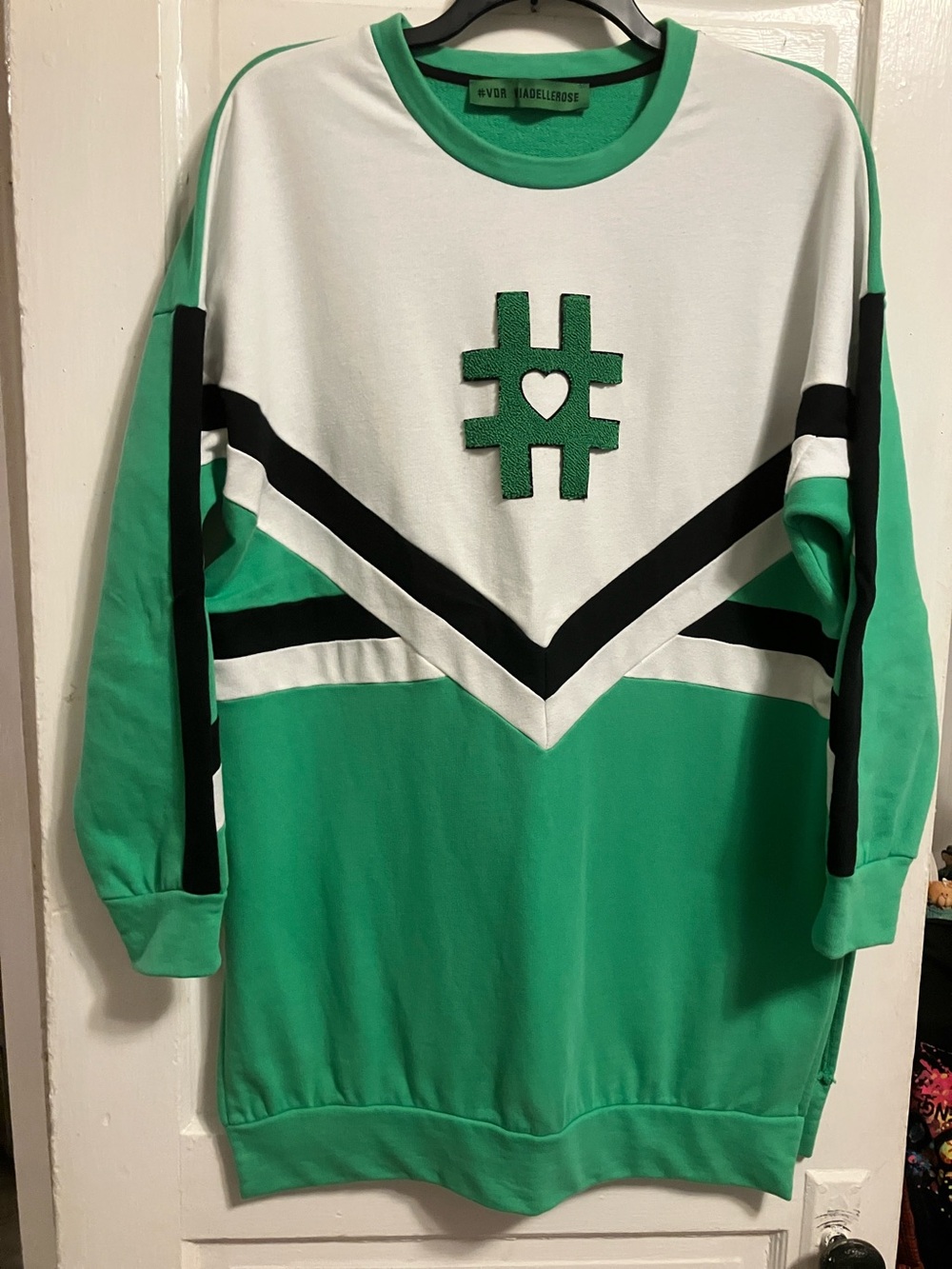 Like new. Oversized ,one size fits most black , green n white 100%cotton.